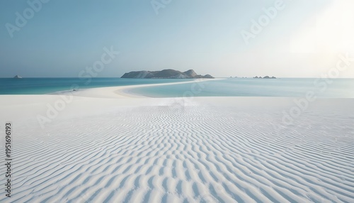 A serene white sand beach with clear blue water