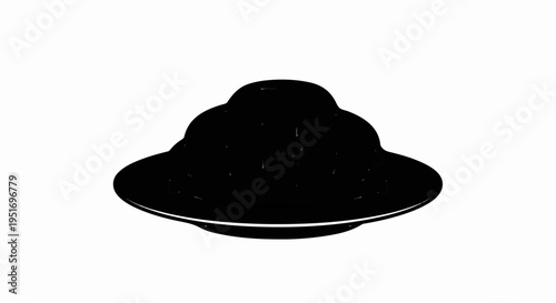 A black, three-domed object with a wide brim