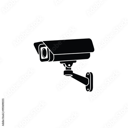 Black and white security camera mounted on wall