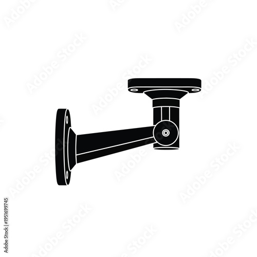 Black silhouette of a security camera mounted on a wall