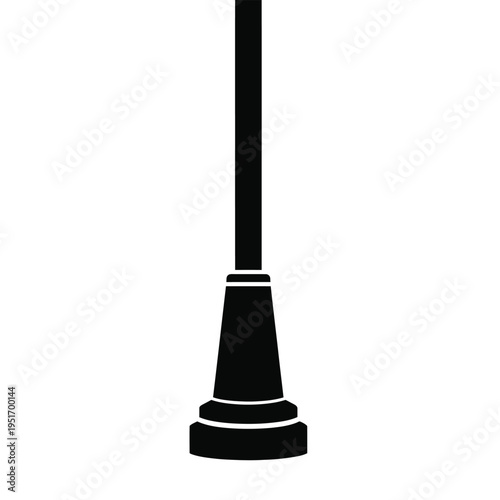 Black silhouette of a cone-shaped street light with multiple tiers