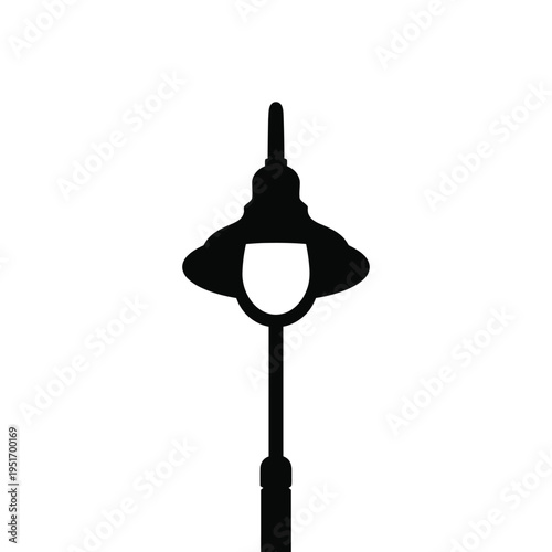 Black silhouette of a traditional street lamp against a white background