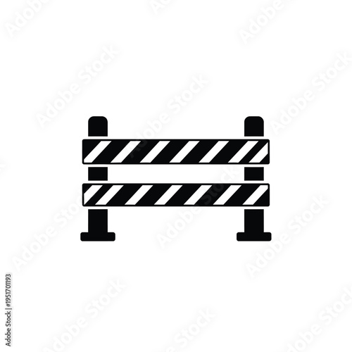 Black and white striped road barrier with four supports