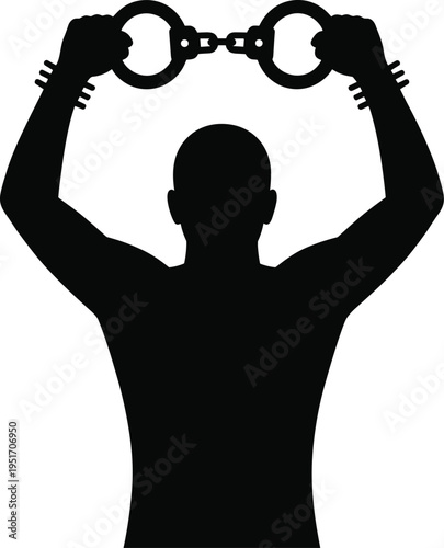 Silhouette of a man breaking free from handcuffs