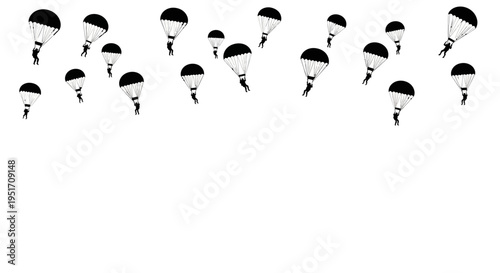 Parachuters in formation flying high in the air with black and white parachutes