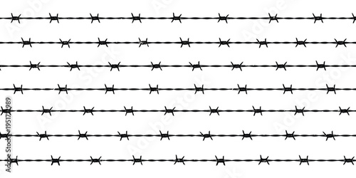 A close up view of multiple strands of barbed wire on a plain white background