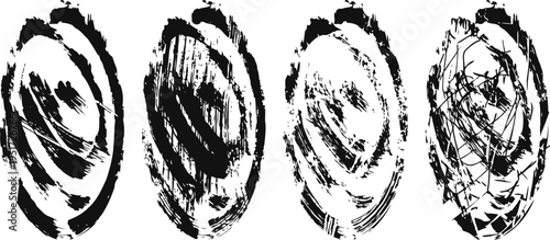 set of four black ink brush stroke spirals with varying texture and intensity on white background