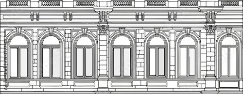 Ornate stone facade with arched windows and classical architectural details