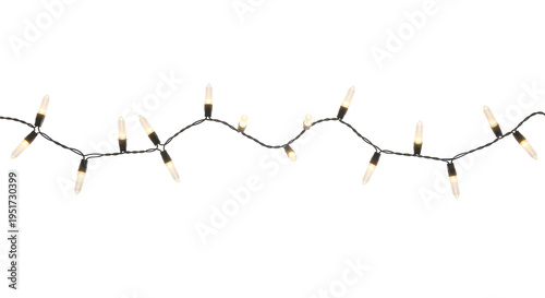 String of white christmas lights on black