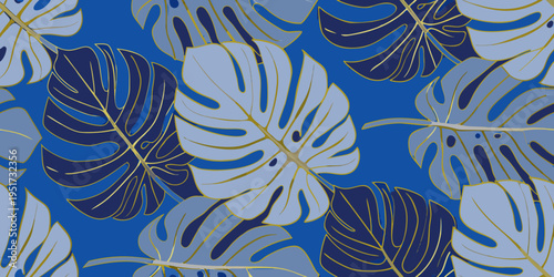 Elegant monstera leaf pattern with gold accents on a blue backdrop