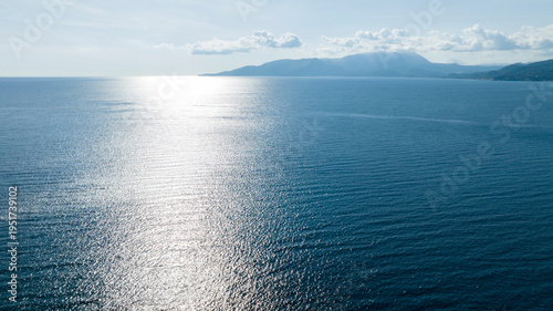 Canvas Print Aerial view of the glistening blue sea under a bright sun