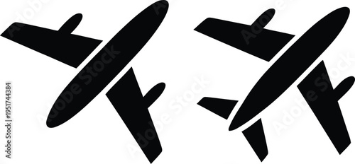 Two vintage military aircraft silhouettes in a dynamic flying formation.