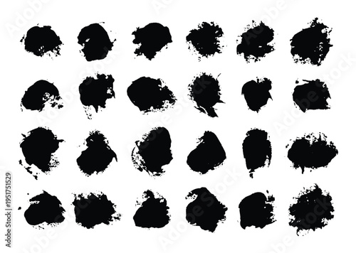 Collection of black ink blots on white background
