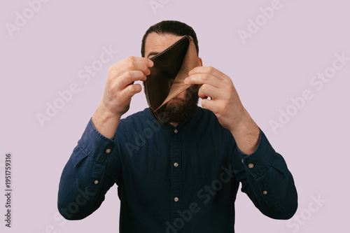 Canvas Print Caucasian Man Revealing Empty Wallet Covering Face, Embarrassed Reaction, Budget