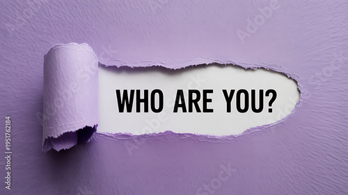 Torn purple paper with 'WHO ARE YOU?' message