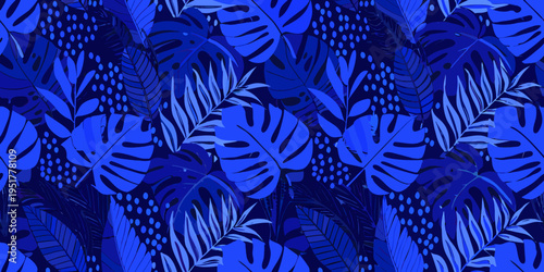 Seamless pattern of vibrant blue tropical monstera and palm leaves