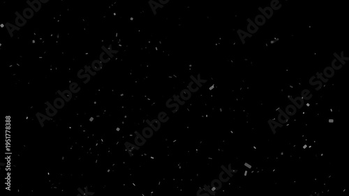 Gentle slow motion white rectangular particles floating and falling like dust or snow on black