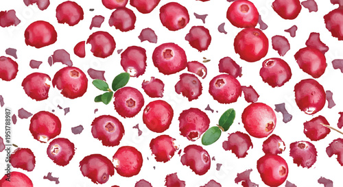The main subject of the image is a bunch of bright red cranberries. These are small, round fruits. The background is white, with a few green leaves scattered among the cranberries, which are probably 