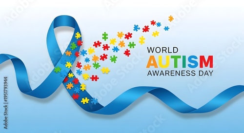 World autism awareness day awareness ribbon with puzzle pieces on blue background