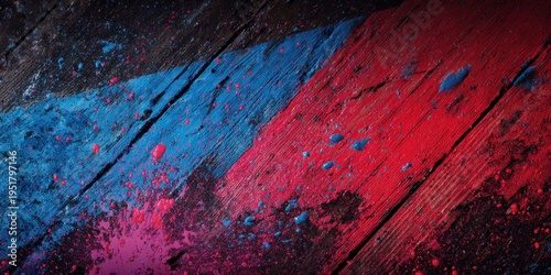 Artistic Strokes: A close-up showcases a weathered wooden surface, beautifully painted with dynamic, overlapping swaths of vibrant blue, red, and purple hues, embodying abstract art.
