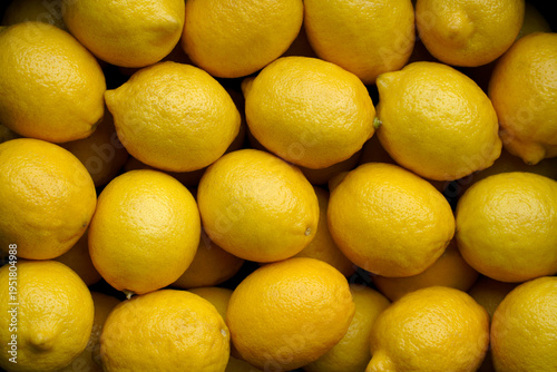 Lemons close up. Juicy citrus background. Full of vitamin C for healthy eating. Organic nutrition and diet concepts.