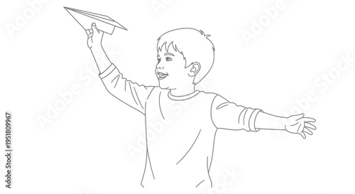 A young boy joyfully launches a paper airplane into the air