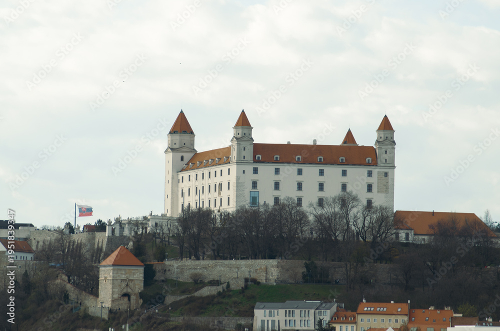 Fototapeta premium Historical Bratislava Castle with crown tower and white stone walls, Slovakia
