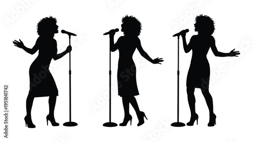 Silhouette of a woman singing on stage with microphone