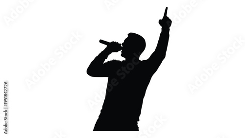 A man singing into a microphone with one arm raised