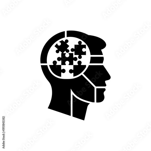 Black silhouette of a human head with puzzle pieces inside, symbolizing mental health and brain function.