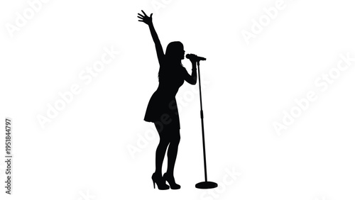 A woman in a dress singing into a microphone