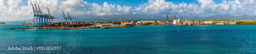 Fotografia A panorama view across the industrial port in Pointe a Pitre, Guadeloupe on a br