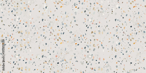 Abstract background with scattered colorful speckles on a light gray base