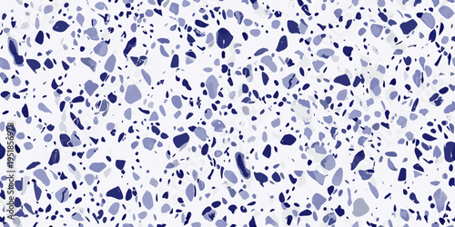 Abstract pattern of scattered blue and white speckled shapes