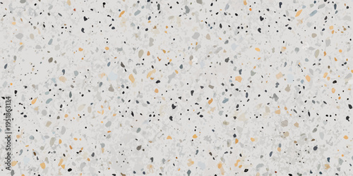 A close up view of a speckled terrazzo like surface with varied colors