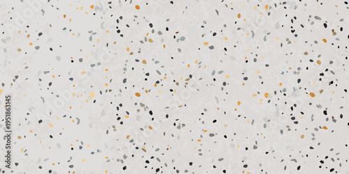 Abstract background featuring a speckled pattern of grey black and gold