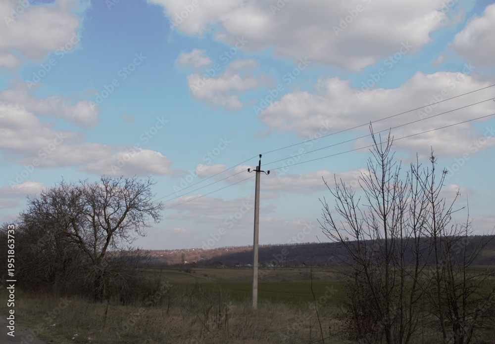 Obraz premium Power lines in a field