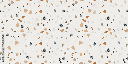 Abstract terrazzo pattern with scattered stone chips on a white background