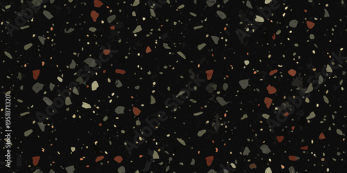 Abstract background featuring a dense scattering of dark irregular particles