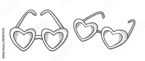Black and white of two pairs of heart shaped sunglasses