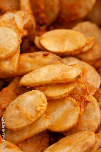 Crispy Battered Potato Slices golden brown deep fried or Traditional Potato Bajia