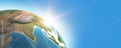 Sunrise on detailed satellite cartography of Earth globe from space, South East Asia, blue banner