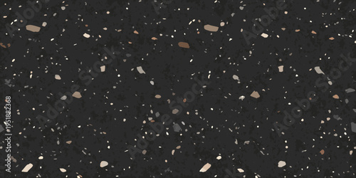 Dark speckled texture resembling terrazzo or concrete with scattered fragments