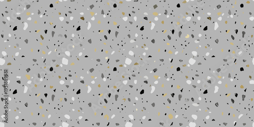 Abstract gray terrazzo pattern with scattered black white and gold flecks