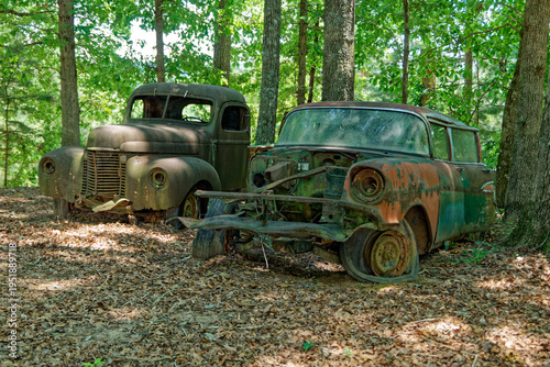 Abandoned vehicles in the forest