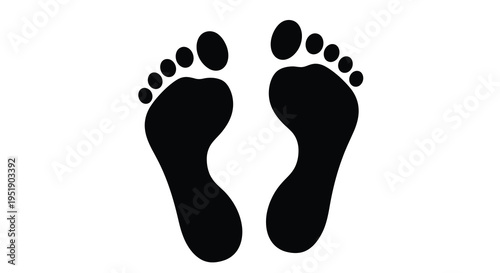 A stark black and white image depicts two human footprints side by side suggesting a trail or passage high quality professional