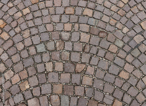 Circular cobblestone pavement pattern texture background