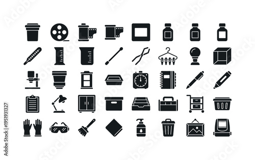 Photo development and darkroom chemistry including developing tank, film reel spool, film canister container, film strip negative,