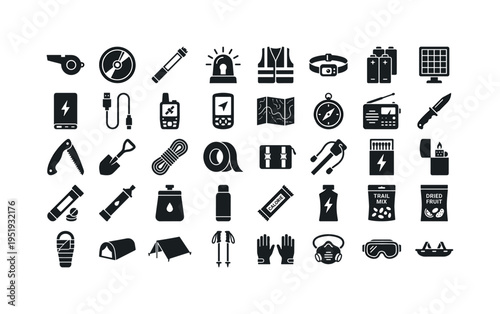 Remote wilderness emergency care supplies showing rescue whistle orange, signal mirror disc, emergency flare stick, LED beacon