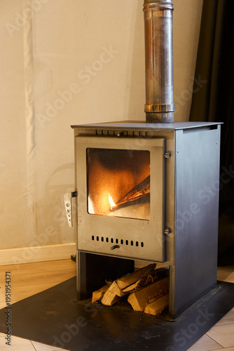 Calm and stylish ambiance created by burning wood and firelight